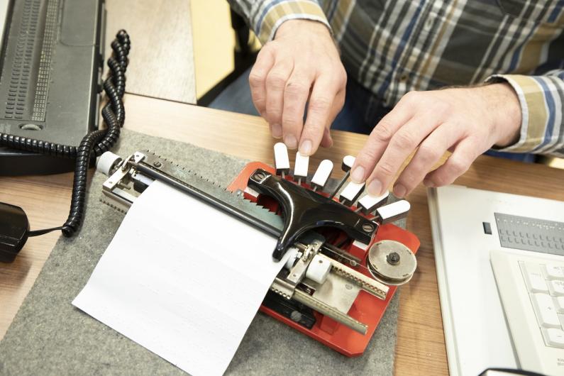 Braille type machine